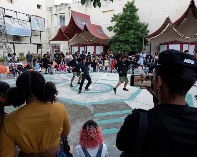 Young Cuban fans of popular Korean K-pop music dance at the San Fan Con square in Havana, Cuba, Oct. 21, 2023. (AFP Photo)