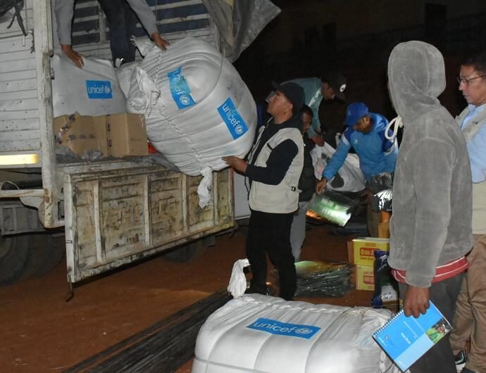 UNICEF staff unload relief supplies in the earthquake-hit Jajarkot district in western Nepal.