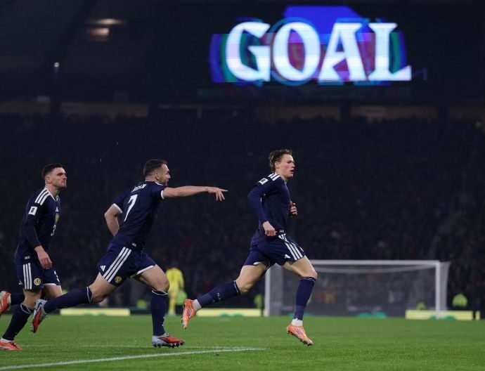 2025 11 18T215911Z 716194896 UP1ELBI1J73YI RTRMADP 3 SOCCER WORLDCUP SCO DNK 1763519675