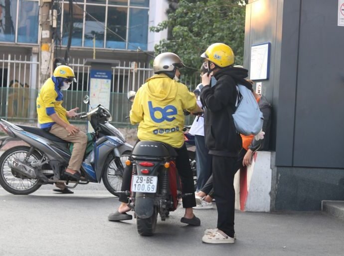 A driver for the ride hailing app Be picks up a passenger at Thu Duc metro station.Govi Snell Al Jazeera. 30 03 1775367408