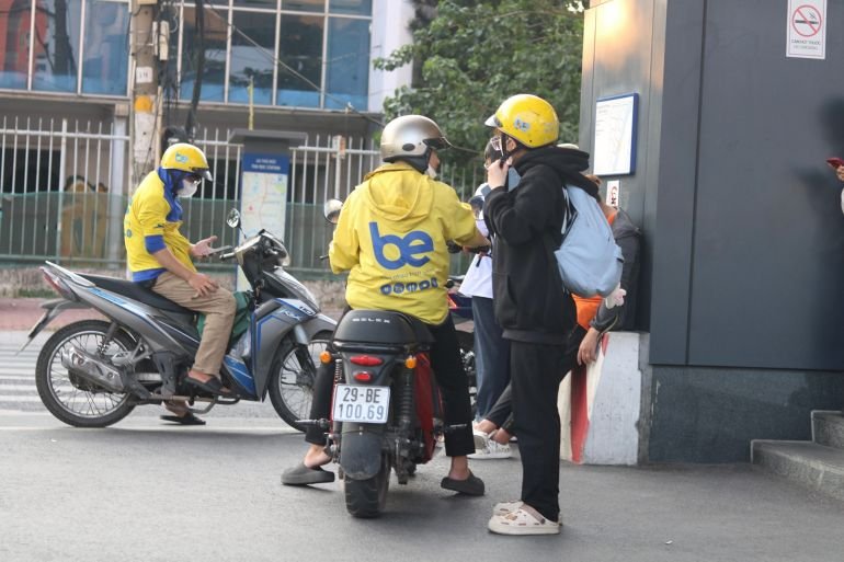 A driver for the ride hailing app Be picks up a passenger at Thu Duc metro station.Govi Snell Al Jazeera. 30 03 1775367408